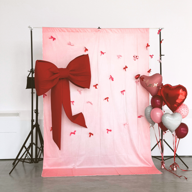 Foto Backdrop pink, rot mit Riesen-Schleife, trendy Fotobox Hintergrund